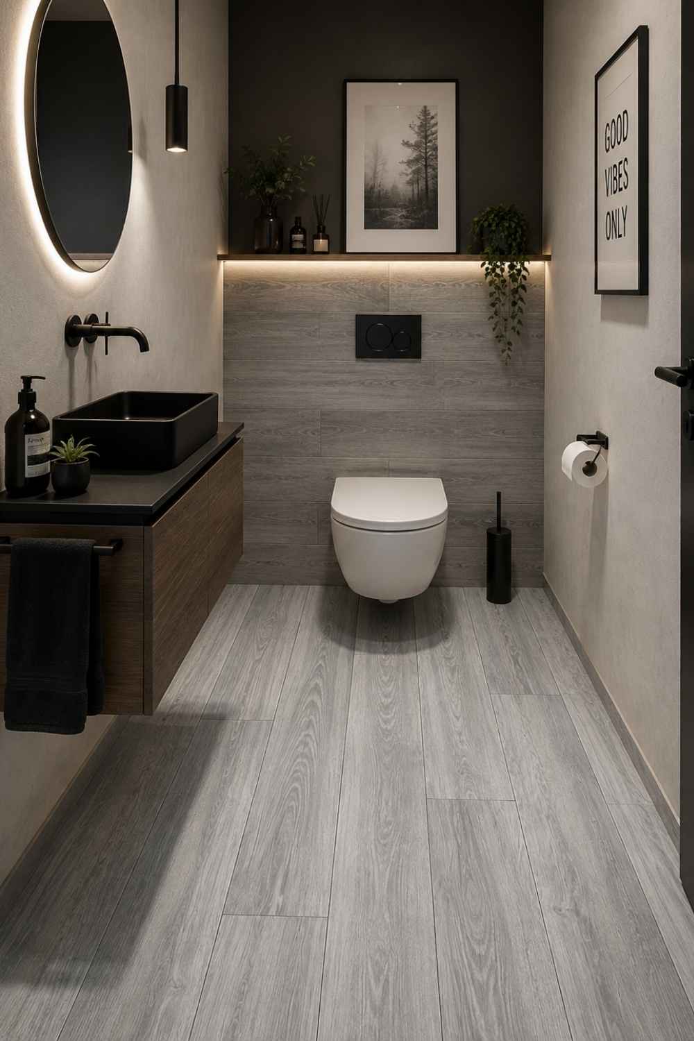 Noce Grau 20x120 cm in grauer Holzoptik als Boden- und Wandfliese im modernen Gäste-WC mit schwarzem Waschtisch